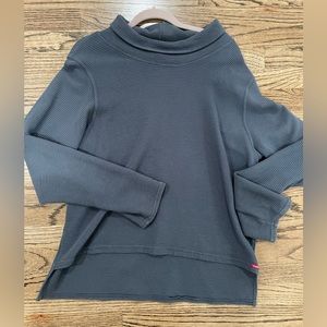 Hard tail mock neck pullover
